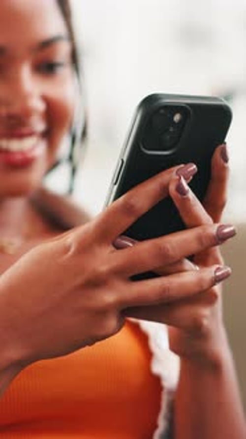 Woman Uses Smartphone in Vertical Portrait
