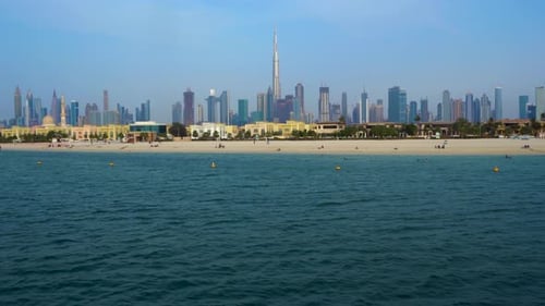 Dubai skyline showing Dubai Creek and business bay. Beautiful sunny day across the beaches.