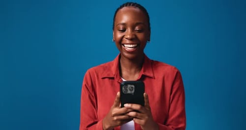 Phone, laughing and social media with business black woman in studio for comedy