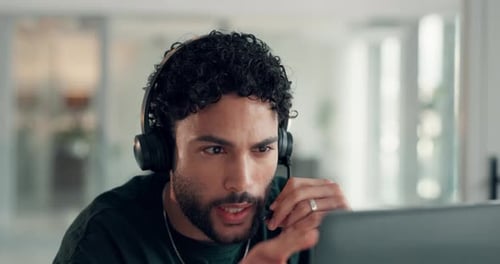 Businessman, consultant and talking with headset in call center for customer service or advice