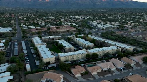 Hyperlapse rotating drone shot of apartment buildings and traffic in Tuscon Arizona