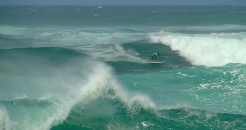 Man Surfs Large Wave In Crystal Blue Hawaii Ocean, Slow Motion
