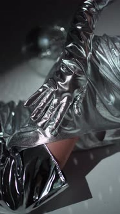 Shimmering Silver Dress and Gloves Fashion Concept