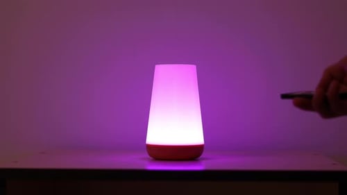 Color Changing Dimmable Lamp on Wooden Surface
