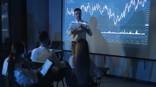 Corporate Presentation to Small Tech Team in Dark Office