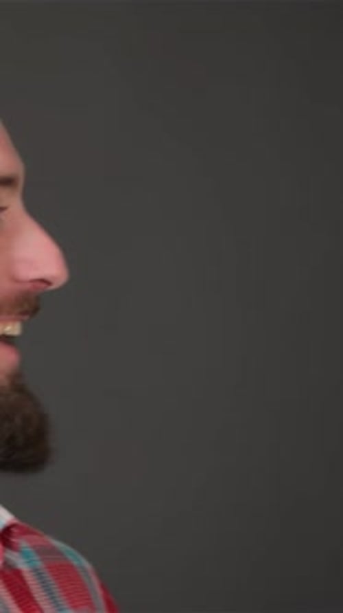 Smiling Man Gives Thumbs Up