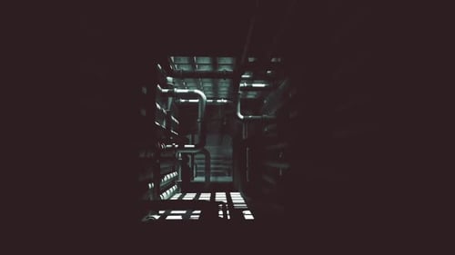 Exploring the Dark Industrial Interior of a Spacious Concrete Building