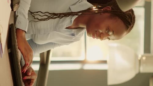 Vertical Video Business Woman Browsing Internet on Computer to Work on Report