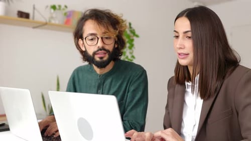 Teamwork in Office with Laptops and Collaboration