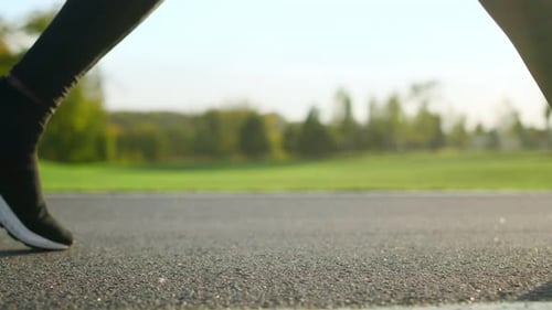 Close Up of Man Feet Dancing on Road. Active Sportsman Legs Jumping
