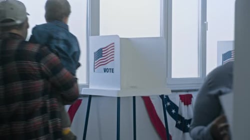 Diverse American Citizens Come to Vote in Polling Station Office
