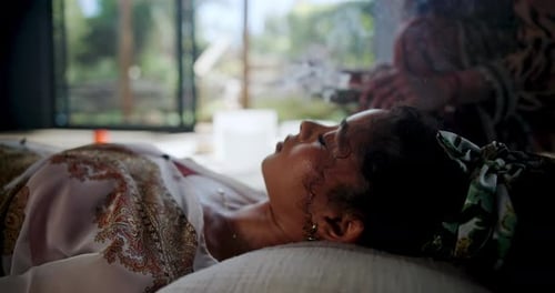 Woman, aromatherapy and burning sage for healing, ritual with shaman and natural medicine for energy