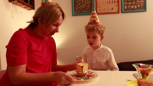 Mother and Child Celebrate Birthday Indoors