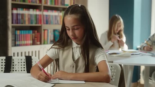 Caucasian Little Girl Portrait in School Smiling Joyful Kid Child Teen Studying at Classroom Writing