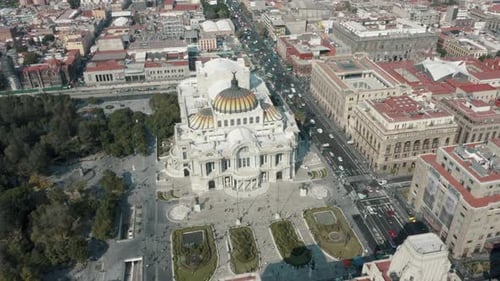 Mexico City With The Iconic Palace of Fine Arts (Palacio de Bellas Artes) - aerial drone shot