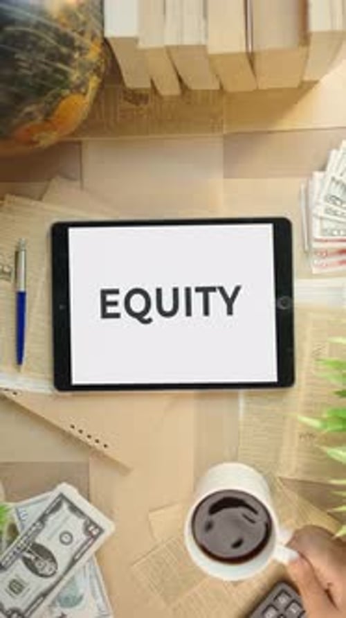 Equity Displayed on Tablet with Coffee