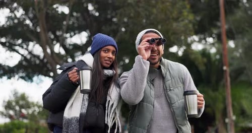 Binocular, relax or couple in nature hiking in forest together on holiday vacation outdoors