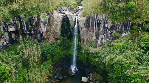 Aerial Water Falling Cliff Nature Huge Waterfall Streaming at Mountain Forest