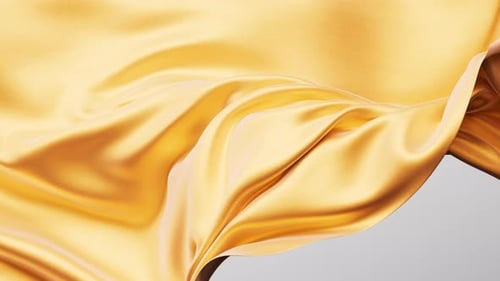 Elegant Golden Silk Fabric Flowing Abstract Background