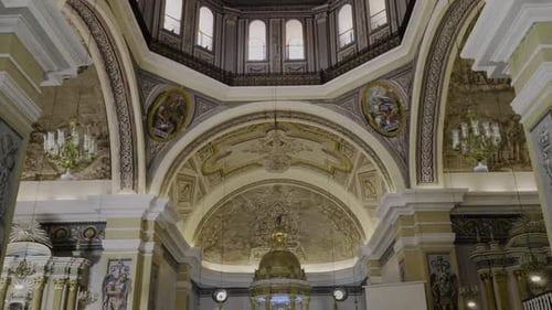 An inside view of a Basilica Church with its antique and artistic architecture.