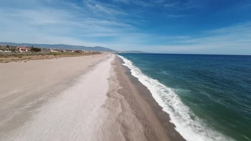 Calm Sea Waves Along the Coast