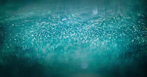 Abstract Teal Background with Flowing Sparkling Lights
