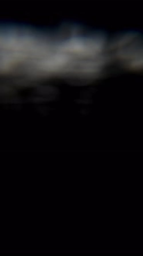 Bokeh Circles Glowing In Dark Background