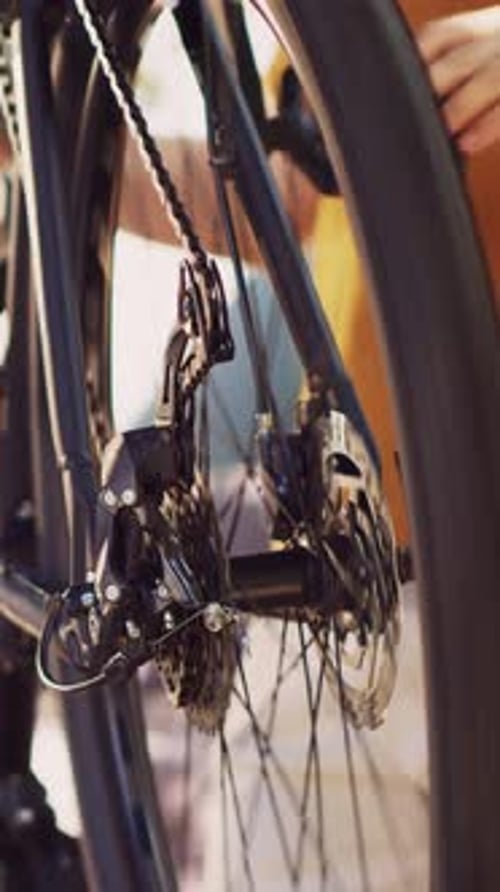 Close Up of Bicycle Wheel and Gears Turning