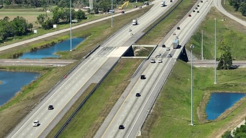 Top View of Multilane American Highway with Rapid Driving Cars During Rush Hour in Sarasota County