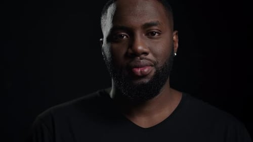 Man Portrait with Beard Looking at Camera Studio