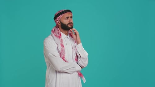 Man Thinking with Idea in Traditional Clothing