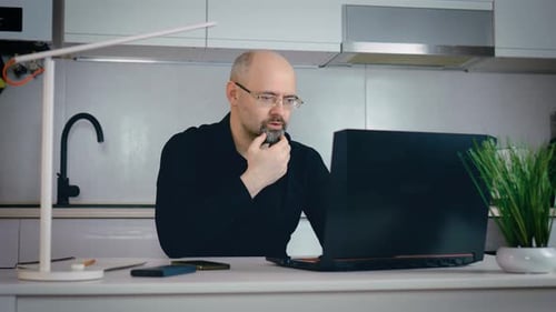 Business Man Talking About Sale Report in Video Conference