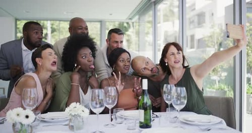 Happy Friends Taking Selfie at Dinner Party