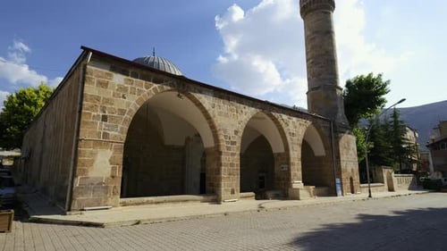 Exterior view of a very old historical mosque.
Elbistan Ulu mosque. 4K. Turkey. 1.