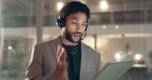 Business, man and talk with tablet at call centre for help, inquiry and customer service at night