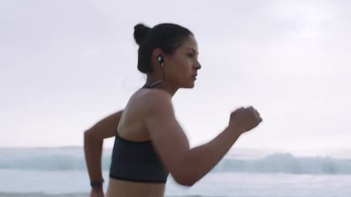 Running, energy and fitness with woman at beach training for marathon, endurance