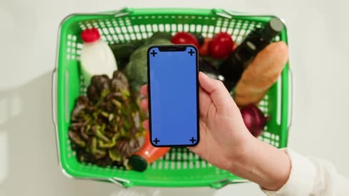 Food Shopping Delivery Online Shop Application Smartphone with Blue Chroma Key Screen and Fresh