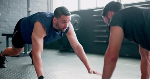 High five, teamwork and fitness with people in gym and plank for sports, workout and cardio