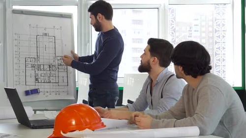 Dynamic Architect Team Collaborates on Building Project