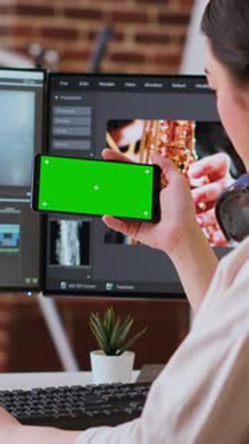 Vertical Video Asian Female Editor Working From Home for Freelance Work with Green Screen