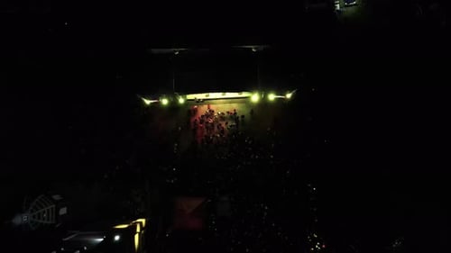 aerial view of concert crowd in front of stage in Mexico City.