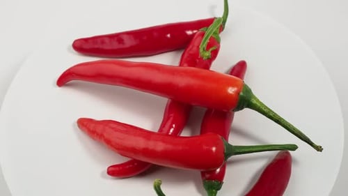 Pile of Spicy Red Chili Peppers on Plate