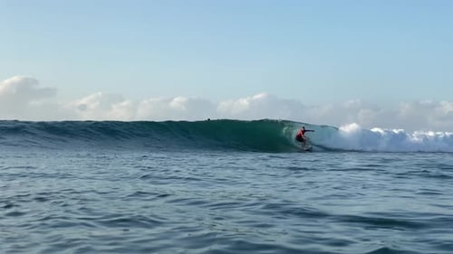 Young Man Surfing in the Ocean