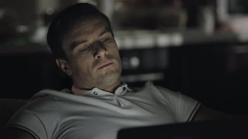 Closeup Tired Man Working Late with Laptop at Home Office. Exhausted Businessman