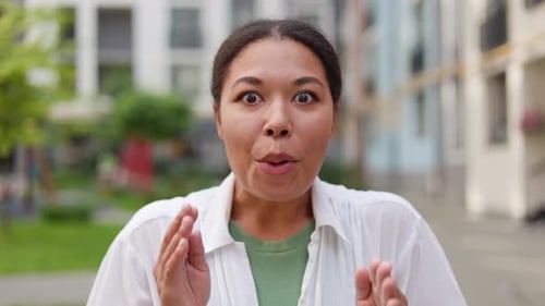 Surprised Woman Smiling Outdoors