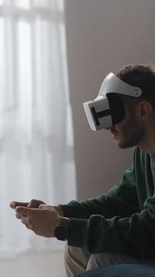Man Using Virtual Reality Headset in Bright Room