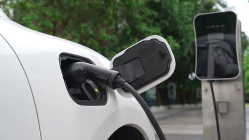 Progressive Concept of Electric Car Parking and Recharging at Charging Station