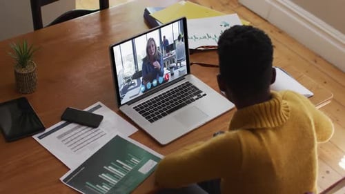 Person on Video Call with Laptop at Home
