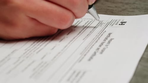 Filling Out W-9 Tax Form Close Up