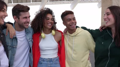 Five Young Adults Laughing Together